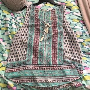 Mint colored print tank. Sheer material